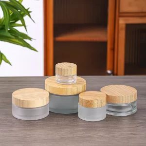10g 30g 50g 100g Frosted Glass Cream Jars with Bamboo Lid Wide Mouth Clear Glass Jar Child Resistant Lid Custom Logo Packaging Box