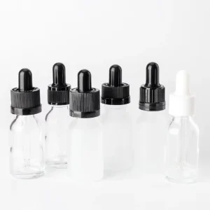 18-415 Empty Glass Dropper Bottles for Transparent Essential Oils and Diffuser Packaging 20ml 100ml Sizes Modern Design