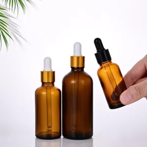 30ml 50ml Amber Glass Dropper Bottles for Skincare Serum and Massage Oil with Gold Aluminum Dropper and Screen Printing