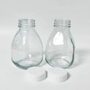 500ml Short Clear Squat Glass Bottle with Tamper-Proof Cap for Juice Milk Tea Beverage and Mineral Water