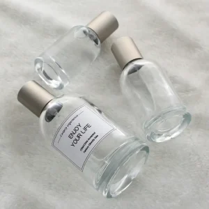 50ml 150ml Clear Glass Perfume Bottle with Spray Top