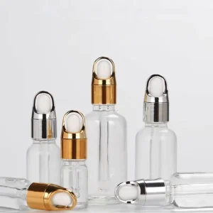Cosmetic Package Glass Bottle Clear 5ml 10ml Glass Dropper Bottle Essential Oil Bottle with Flower Basket Cap