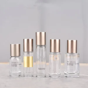 Custom 10ml 30ml Cylinder Clear Glass Perfume Bottle with Matte Gold Frost Finish Sprayer