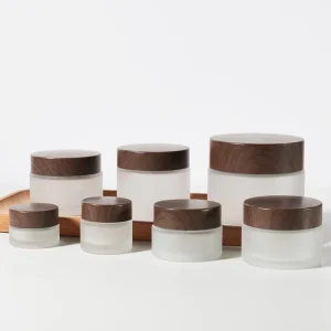 Custom Empty 5G 10G 15G 20G 30G 50G 60G 100G Frosted Clear Face Body Butter Cream Cosmetic Glass Jars With Dark Wood Grain Lids