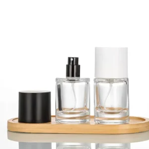 Custom Empty Fast Delivery 50ml Clear Glass Spray Bottles Cylinder Shape Perfume Containers with Matte Black Cap