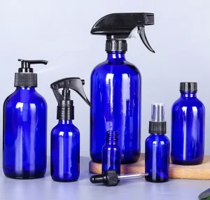 Customized Cylinder Glass Essential Oil Bottles with Screw Cap Dropper Sprayer or Pump Serum Container Blue Skin Care