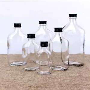 Empty Glass Bottles for Vodka Whisky Champagne Brandy Cocktails and Household Liquids