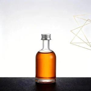 Factory Direct 50ml Cylinder Clear Glass Spirit Liquor Bottle for Whiskey Vodka Tequila Brandy and Gin with Custom Logo