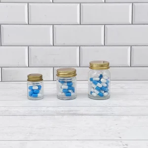 Factory Transparent Straight Tube Glass Jar with Aluminum Cover for Jam Cream and Capsule Packaging