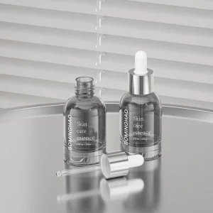 Good Quality Textured Glass Bottle Round Shape Cosmetic Bottle Cosmetic Packaging Glass Bottle with Silver Cap