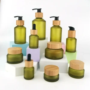 Green Frosted Glass Cosmetic Jars and Bottles with Bamboo Lid for Serum Face Cream Lotion