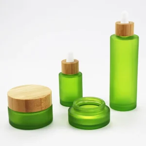 Green Frosted Glass Lotion Bottle and Cream Jar with Bamboo Lid
