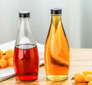 High quality Clear Surface Round Glass Bottles with Screw Cap and Labelled for Mineral Water Beverage Fruit Wine Juice