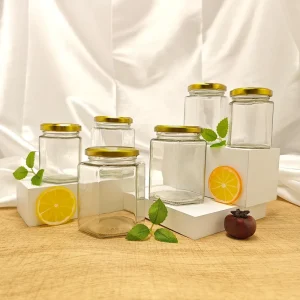 Household Products High Quality Sealed Food Storage Glass Hexagonal Jar with Metal Lid for Honey and Pickles