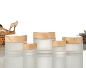 In Stock 20g 30g 60g 100g Cosmetic Glass Jar Wood Grain Lid Frosted Clear Cream Glass Jar Wooden Bamboo Lids