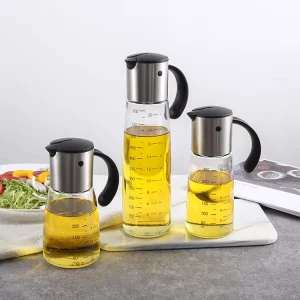 LFGB Round Glass Oil Dispenser Bottle with PP Lid Pourer and Measure