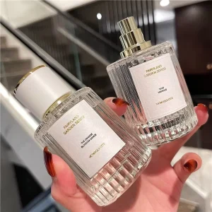 Luxury Custom Perfume Labels Transparent Cylindrical Shape 30ml 50ml 100ml Glass Spray Empty Perfume Bottles With Lid