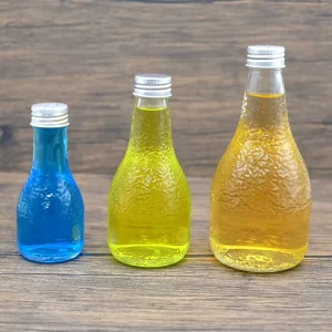Manufacturer Bulk 100ml to 1000ml Clear Glass Beverage Bottles with Aluminum Lids for Wine Juice Tea Milk and Water