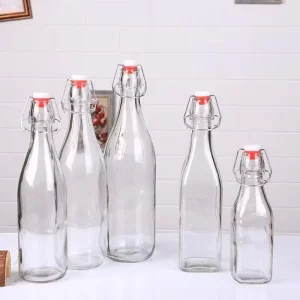Manufacturer Supply 24OZ Transparent Glass Bottles with Clamp Lid for Juice and Beverages