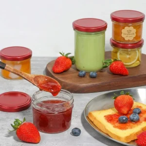 Mingsheng Custom Logo 50ml 70ml 100ml 200ml 380ml Food Storage Mini Round Glass Honey Jam Carviar Glass Jar With Lid
