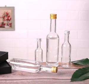 Mini Clear Glass Bottles for Liquor Wine Tea Juice Milk 50ml 150ml 100ml 250ml Bulk Sale for Cold Brew Coffee Tequila Champagne