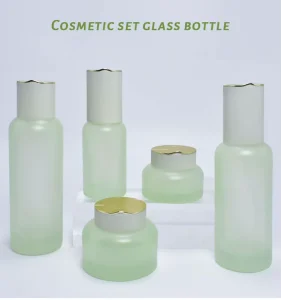 Minimalist Green Glass Bottle Set Eco friendly Cosmetic Packaging with Golden Cap