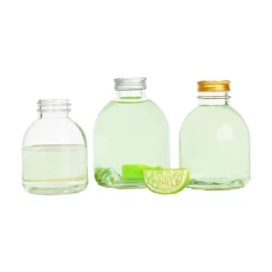 Multi-Size Clear Round Food-Grade Glass Beverage Bottle with Screw Cap for Juice Tea Milk and Cold Drinks