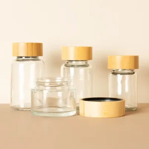 Multiple Sizes 50 60 80 100 120 150ml Glass Storage Jar with Screw Cap Flat Shape for Food Medicine Spices Etc Custom Logo