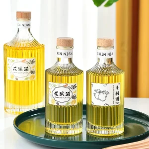 New Design 250ml 500ml Special Embossing Cylinder Glass Bottle Custom Beverage Juice Liquor Bottle Container with Wooden Stopper