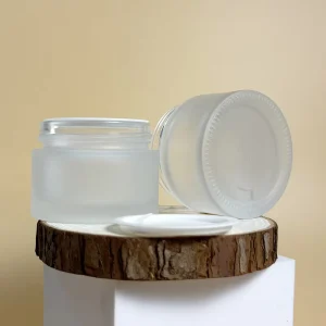 New Design Round Cosmetic Glass Empty Cream Jar with Metal Lid for Packaging Cosmetics