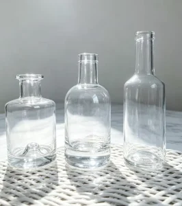 Nordic style 250ml 200ml clear Glass Bottle with Cork Cap Round Glass Bottle for Spirits Vodka Whiskey Gin Shandong Origin