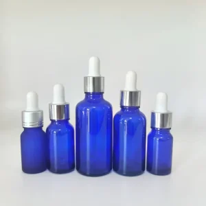 Simple Transparent Blue Glass Essential Oil Bottles Cylinder Shape with Screw Cap Sizes 5ml 10ml 15ml 20ml 30ml 50ml 100ml Stock