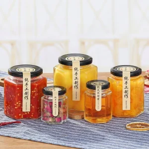 Supplier Canning Glass Jar With Gold Safety Button Lid 45ml 730ml Hexagon Jar