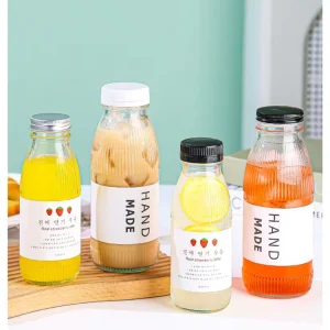 Transparent Empty 300ml 500ml Glass Beverage Bottles with Metal or Plastic Lids