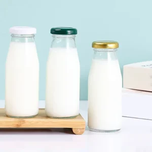 Vintage Refillable Clear Round Food-Grade Glass Milk Bottle for Juice and Beverages